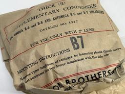 Assortment of Vintage Omega & Simmon Enlarger Condenser Lenses in Original Packaging