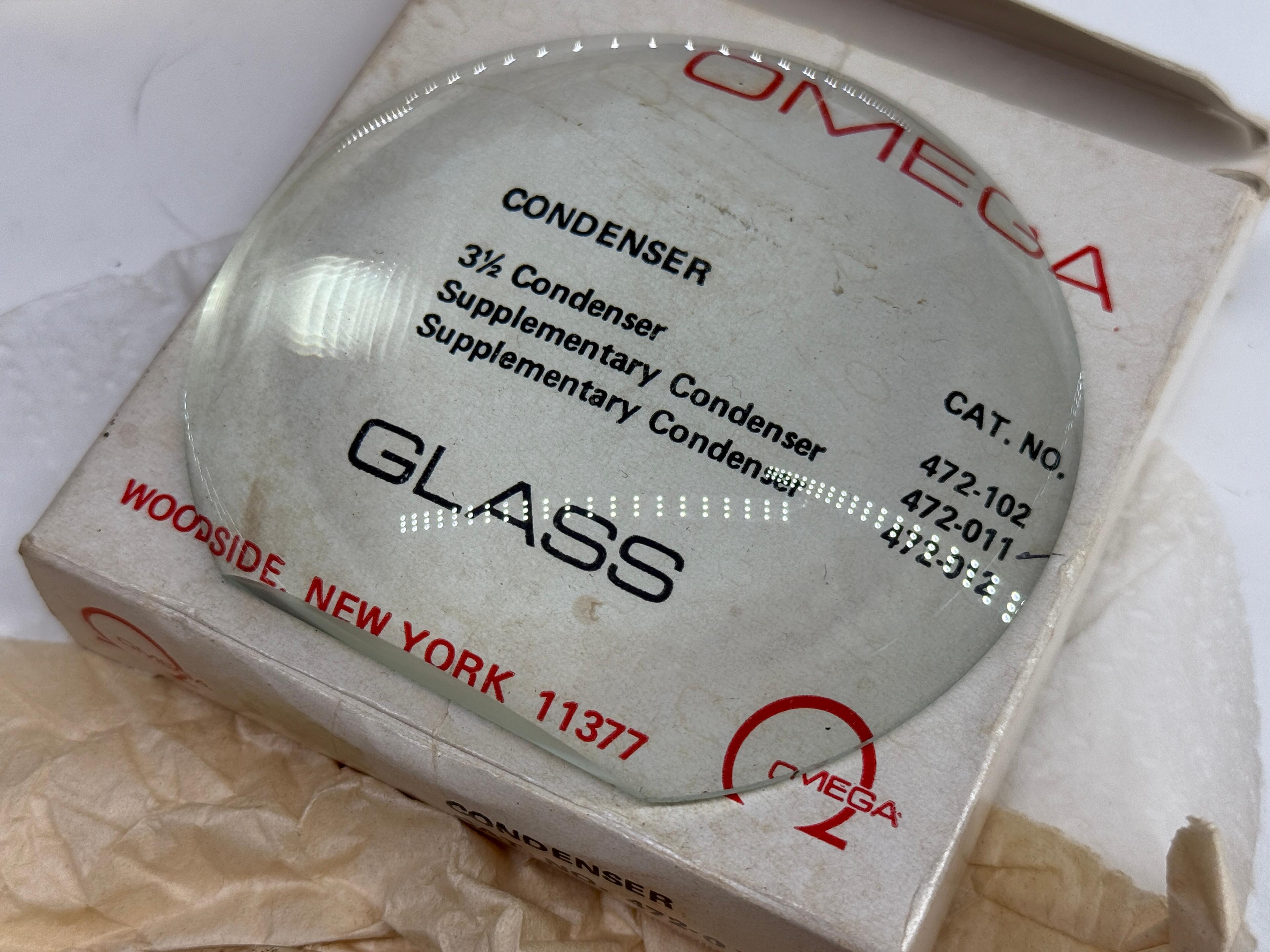 Assortment of Vintage Omega & Simmon Enlarger Condenser Lenses in Original Packaging
