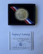 The USO 50th Anniversary Commemorative Silver Dollar Coin - Uncirculated, Authenticated in Case
