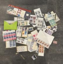Lot of Assorted Postage Stamps – Collectible in Case