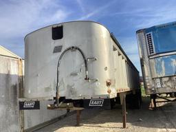 1988 EAST FRAMELESS DUMP TRAILER