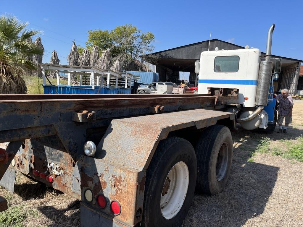 Peterbilt 359 Roll off Truck with (2) Dumpsters