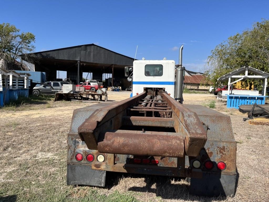 Peterbilt 359 Roll off Truck with (2) Dumpsters