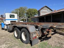 Peterbilt 359 Roll off Truck with (2) Dumpsters