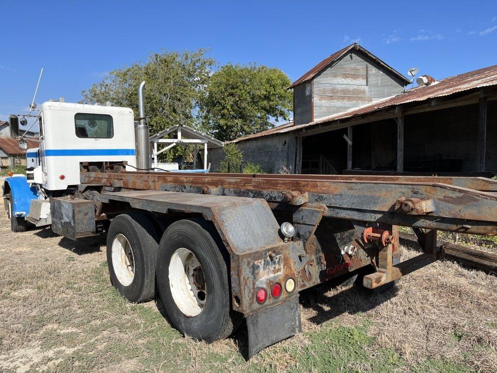 Peterbilt 359 Roll off Truck with (2) Dumpsters
