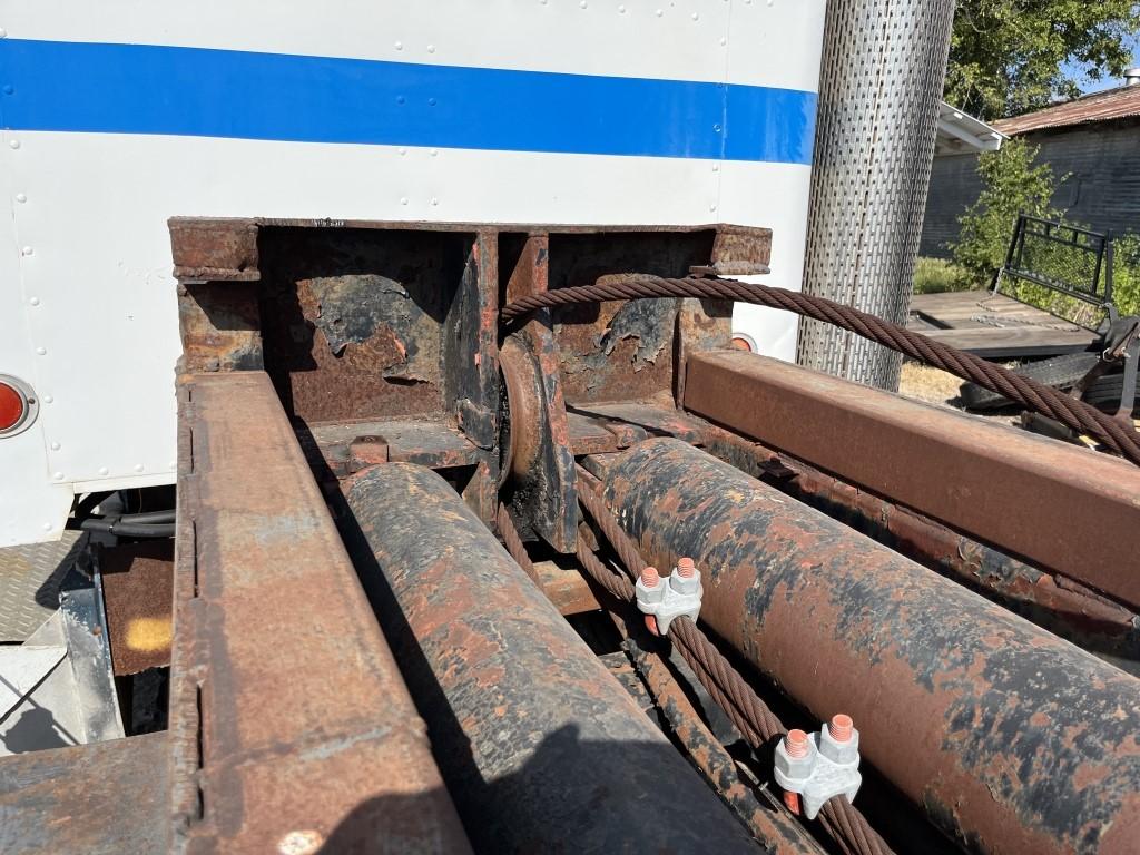 Peterbilt 359 Roll off Truck with (2) Dumpsters