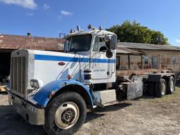 Peterbilt 359 Roll off Truck with (2) Dumpsters
