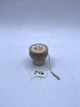 Small with pink lid Avon bottle