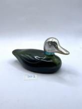 Duck with some liquid Avon bottle