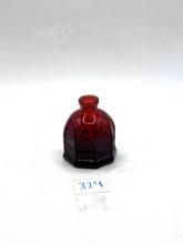 Small red Avon bottle