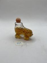 Roller skates with liqud Avon bottle