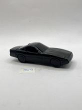 Black car Avon bottle