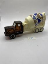 Cement mixer with baby powder Avon bottle