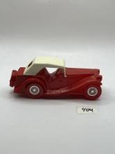 Red car with white top Avon bottle