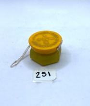 Small yellow Avon bottle