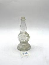 Small clear Avon bottle