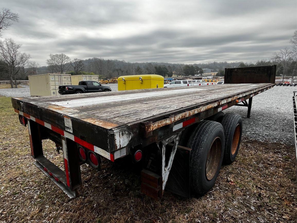 1974  T/A  25’  Flatbed Trailer