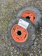 2 Kubota 8.3x16 tractor tires and rims. Good tires