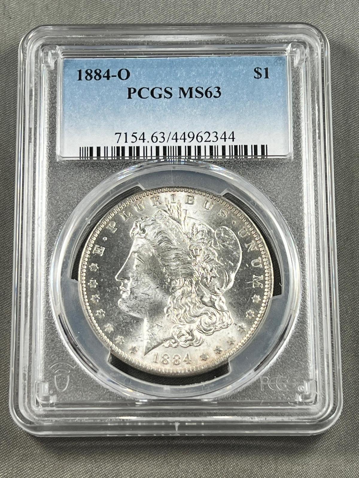 1884-O Morgan Silver Dollar, grade MS63 in PCGS holder