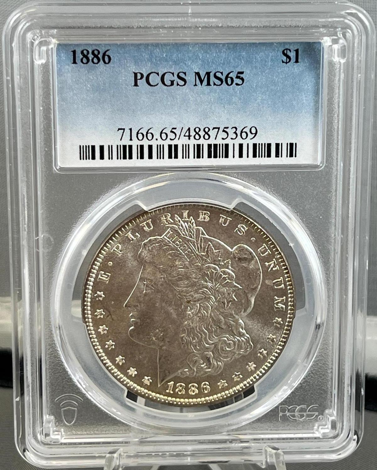 1886 Morgan Silver Dollar in MS65 PCGS Holder