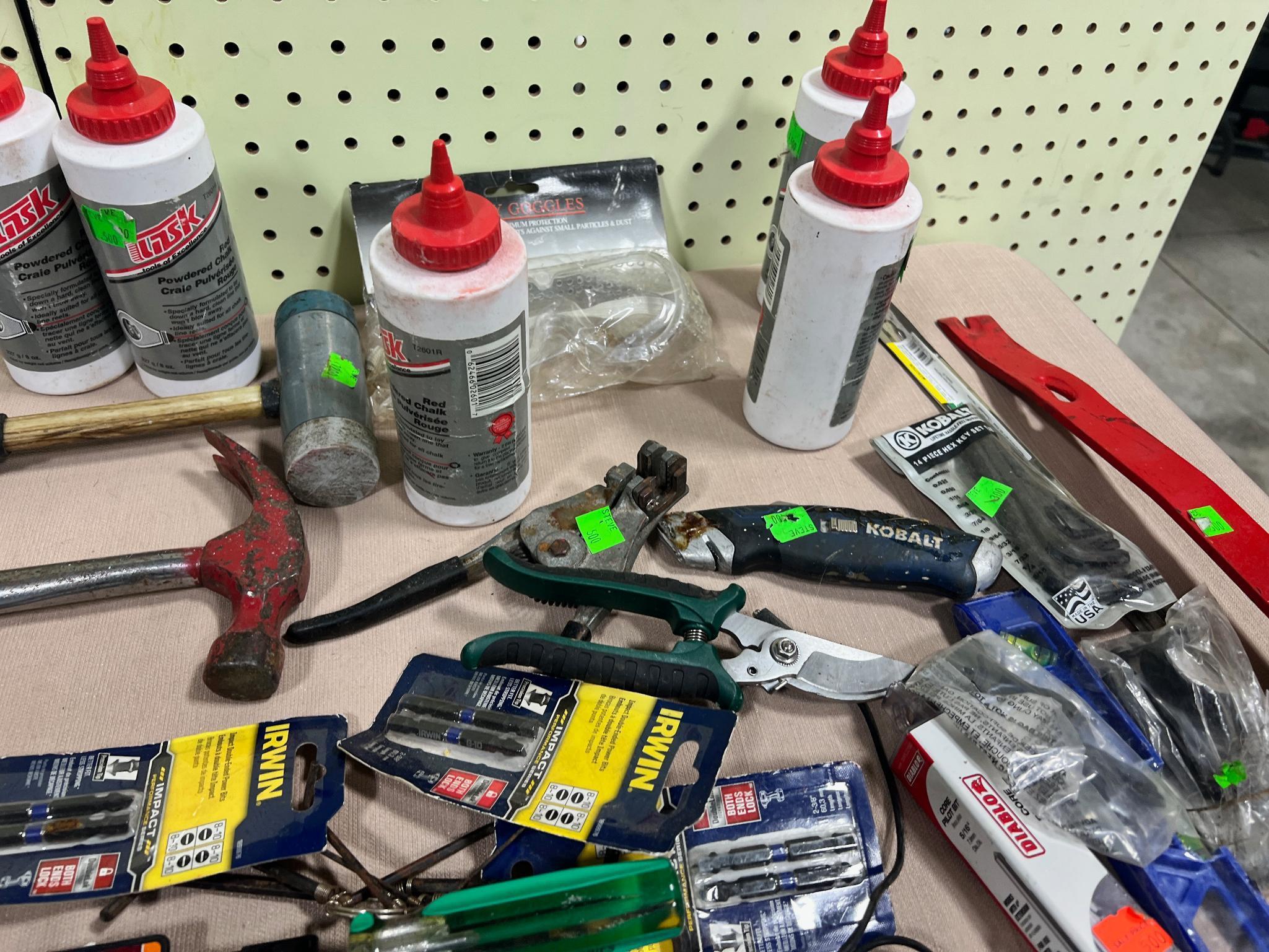 Lot of asst. tools, some unused, Chalk, pry bars, hammers, wrenches and more