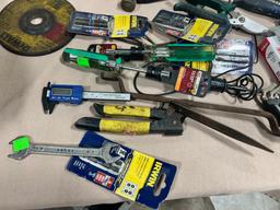 Lot of asst. tools, some unused, Chalk, pry bars, hammers, wrenches and more