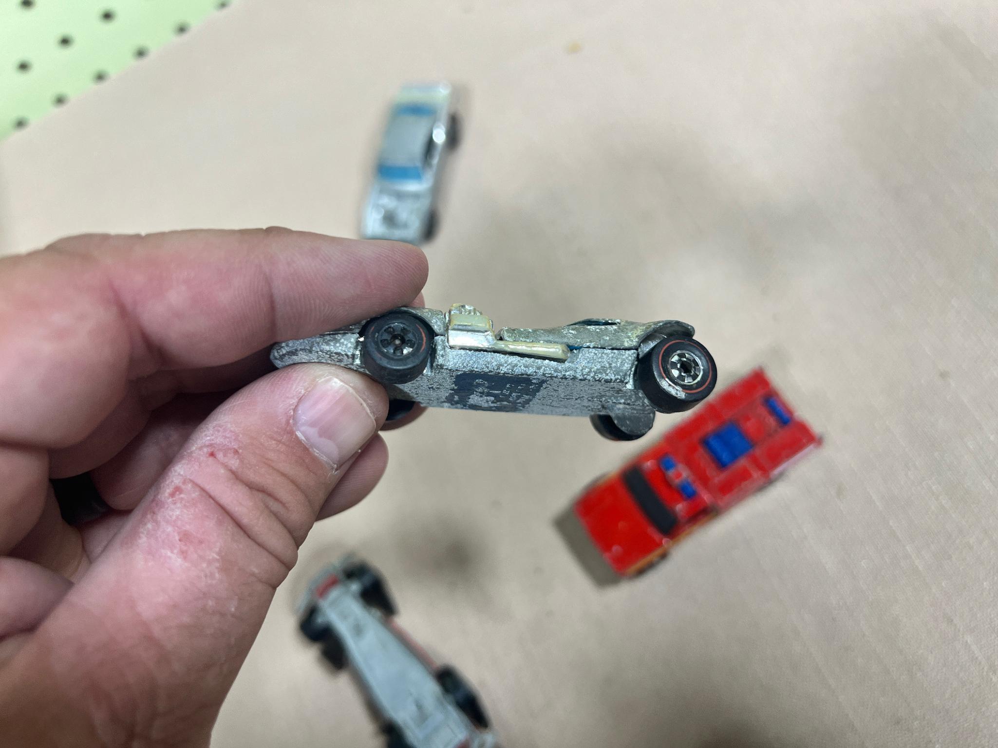 Hot wheels lot of 7, 5 are Redlines