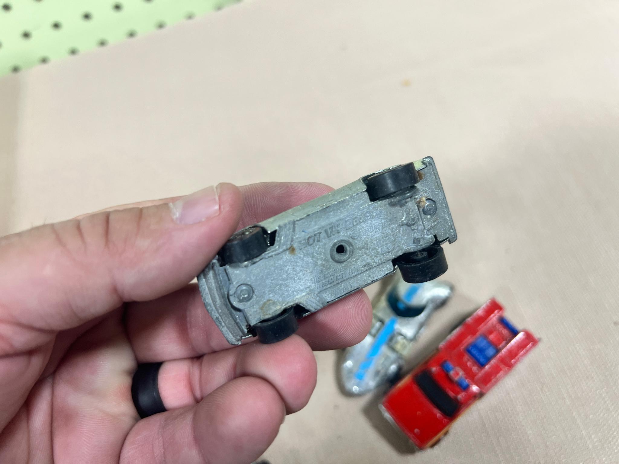 Hot wheels lot of 7, 5 are Redlines