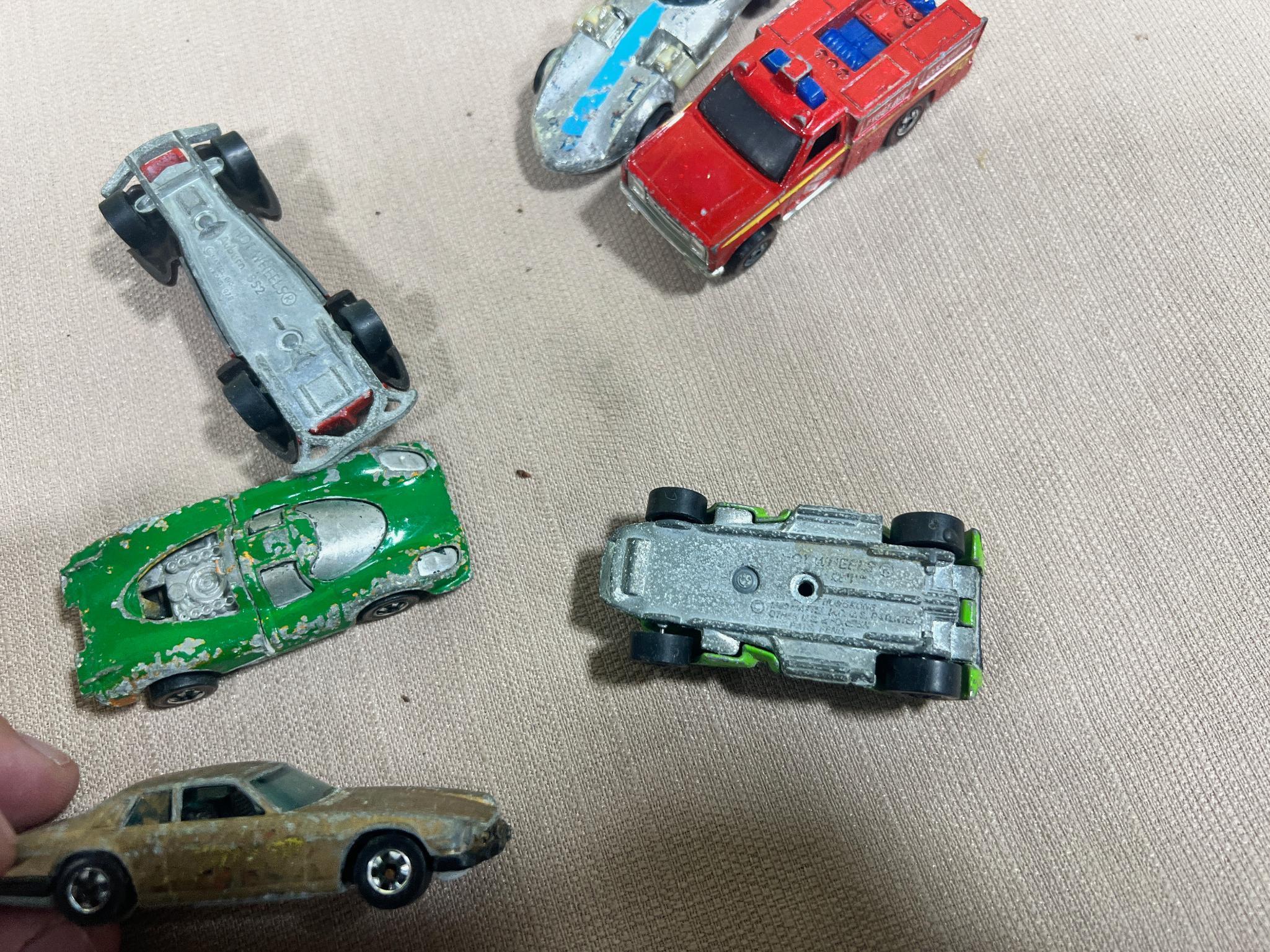 Hot wheels lot of 7, 5 are Redlines
