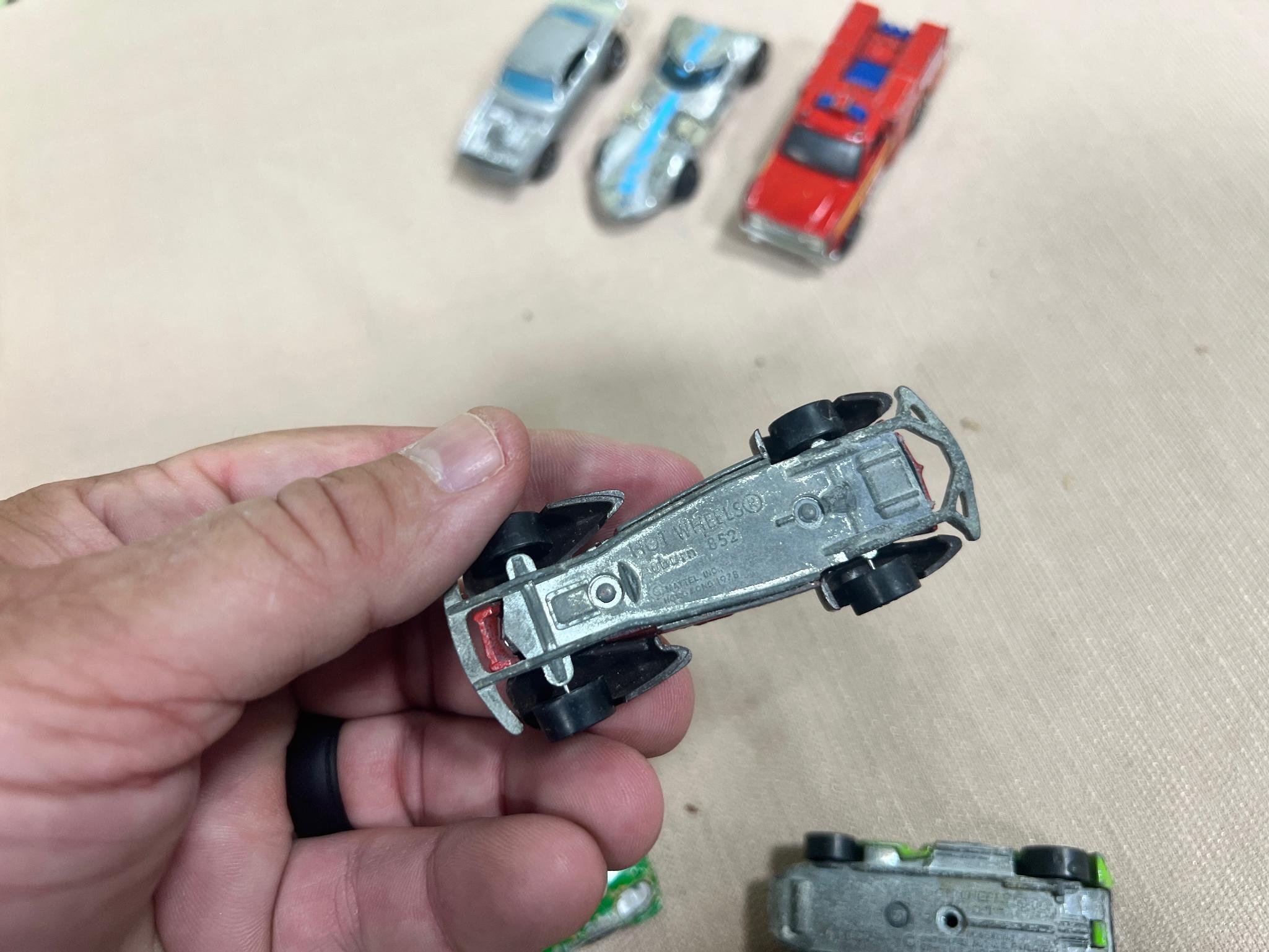 Hot wheels lot of 7, 5 are Redlines