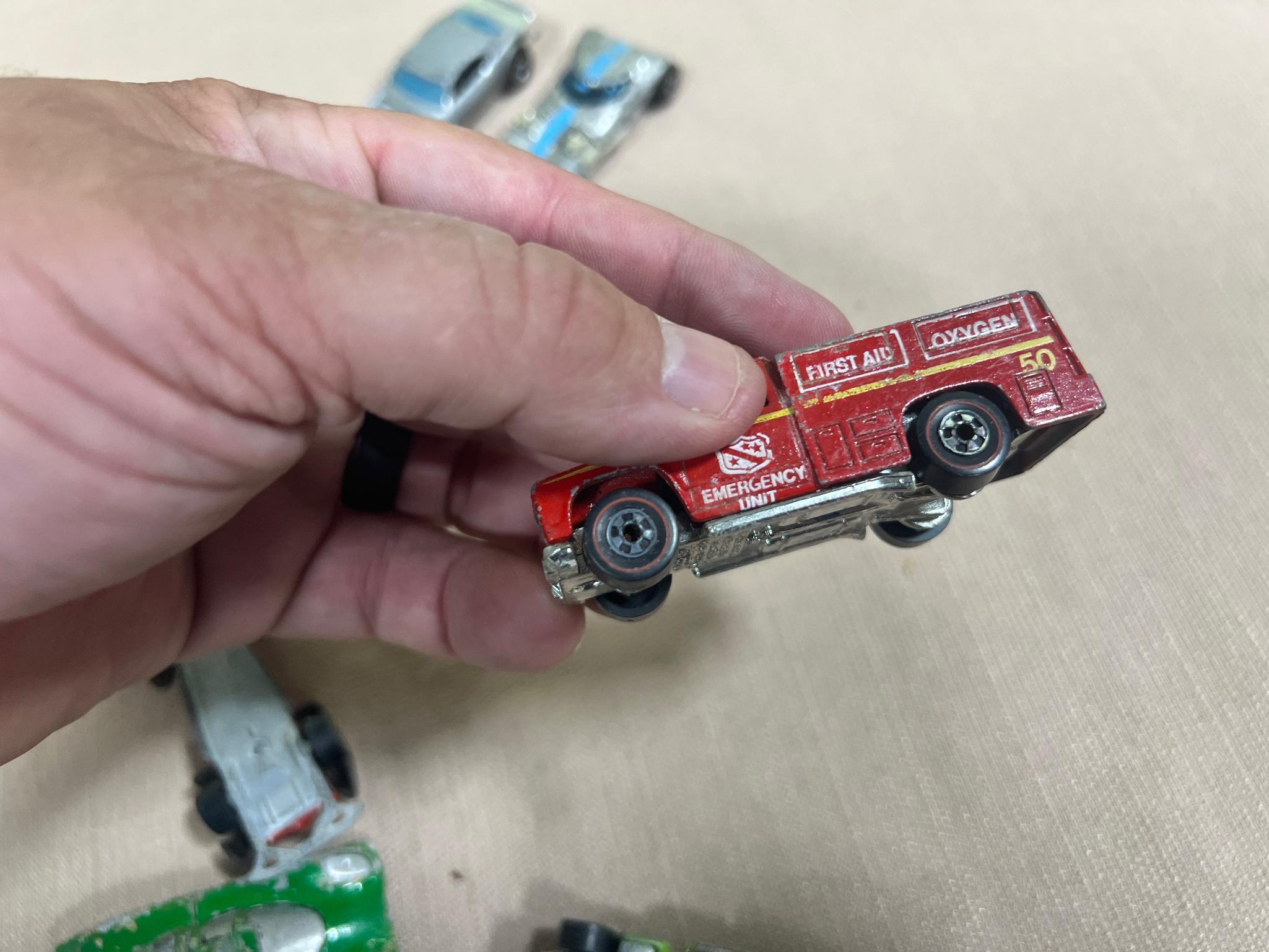 Hot wheels lot of 7, 5 are Redlines