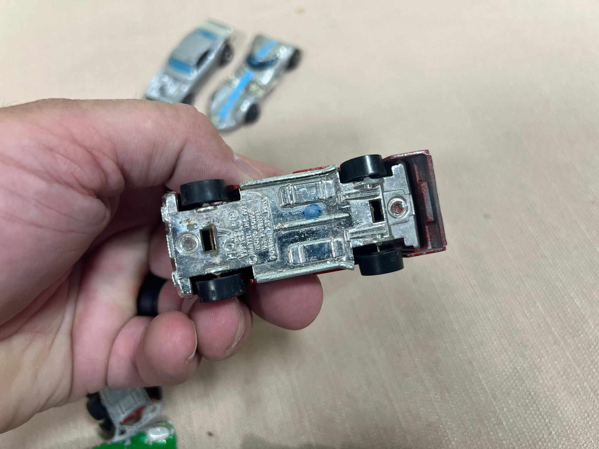 Hot wheels lot of 7, 5 are Redlines