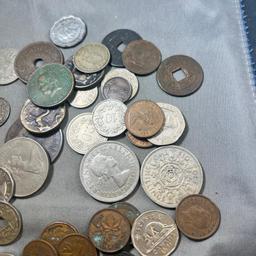 Approx one pound of asst. Foreign coins, and a few tokens