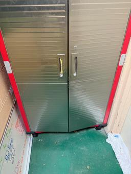 Cabinet 6 ft tall on casters, contents not included, no keys