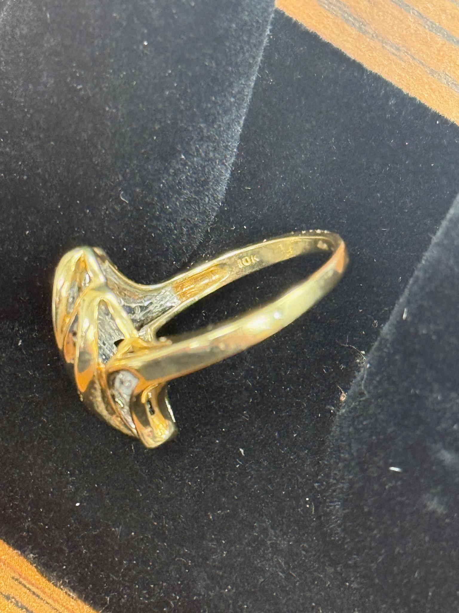 10K stamped gold ring, size 7, weighs approx 4.55 grams