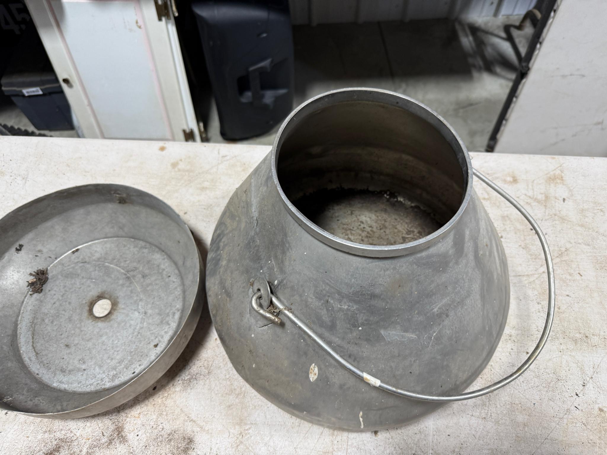 Stainless milk can, 16 inches across at bottom