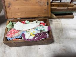 Cedar box full of vintage handkerchiefs and model sail boat