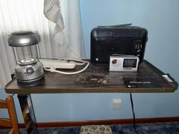 Bedside table w/ contents, light, and radios
