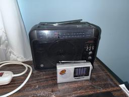 Bedside table w/ contents, light, and radios