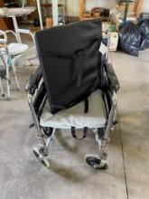 Wheelchair w/ taped up arms