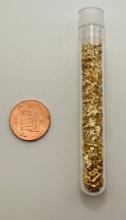 Vial of gold flake, wheat cent for size reference not included