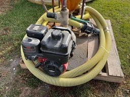 1,500 gal. poly tank w/2in. pump