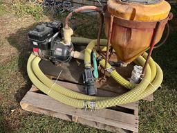1,500 gal. poly tank w/2in. pump