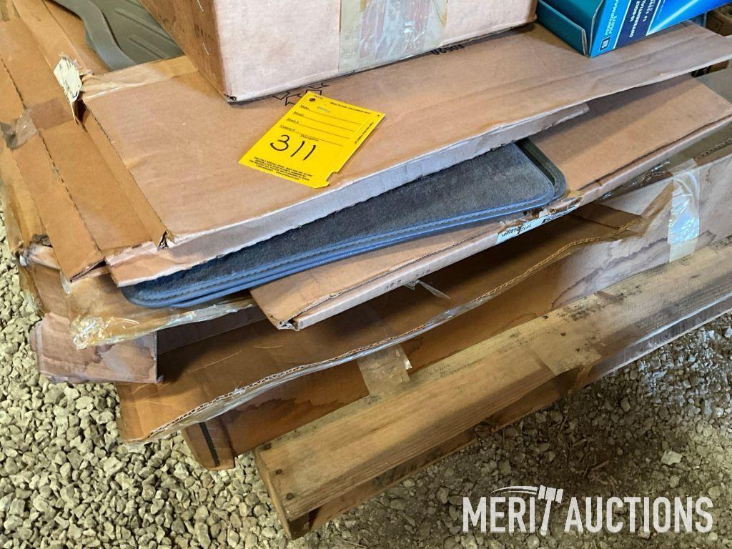 Pallet of GM differensial covers, floor mats, hub caps