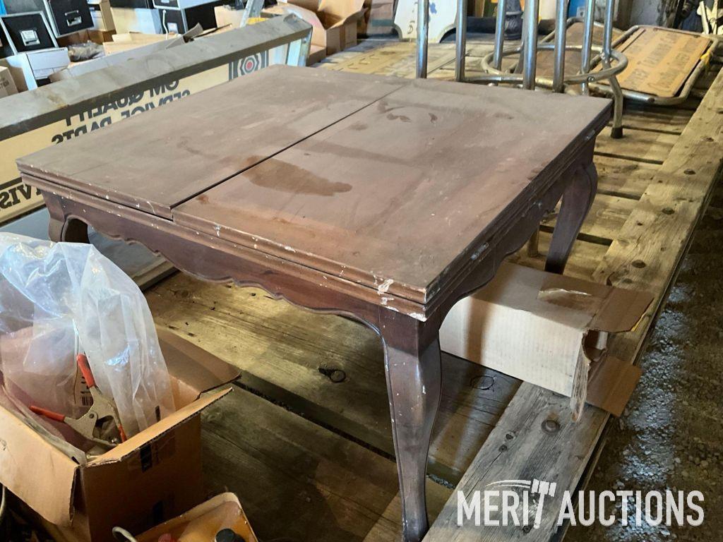 Goodwrench and Chevy bar stools, wooden coffee table, masking tape