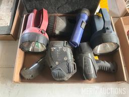 flat of flashlights and a battery box