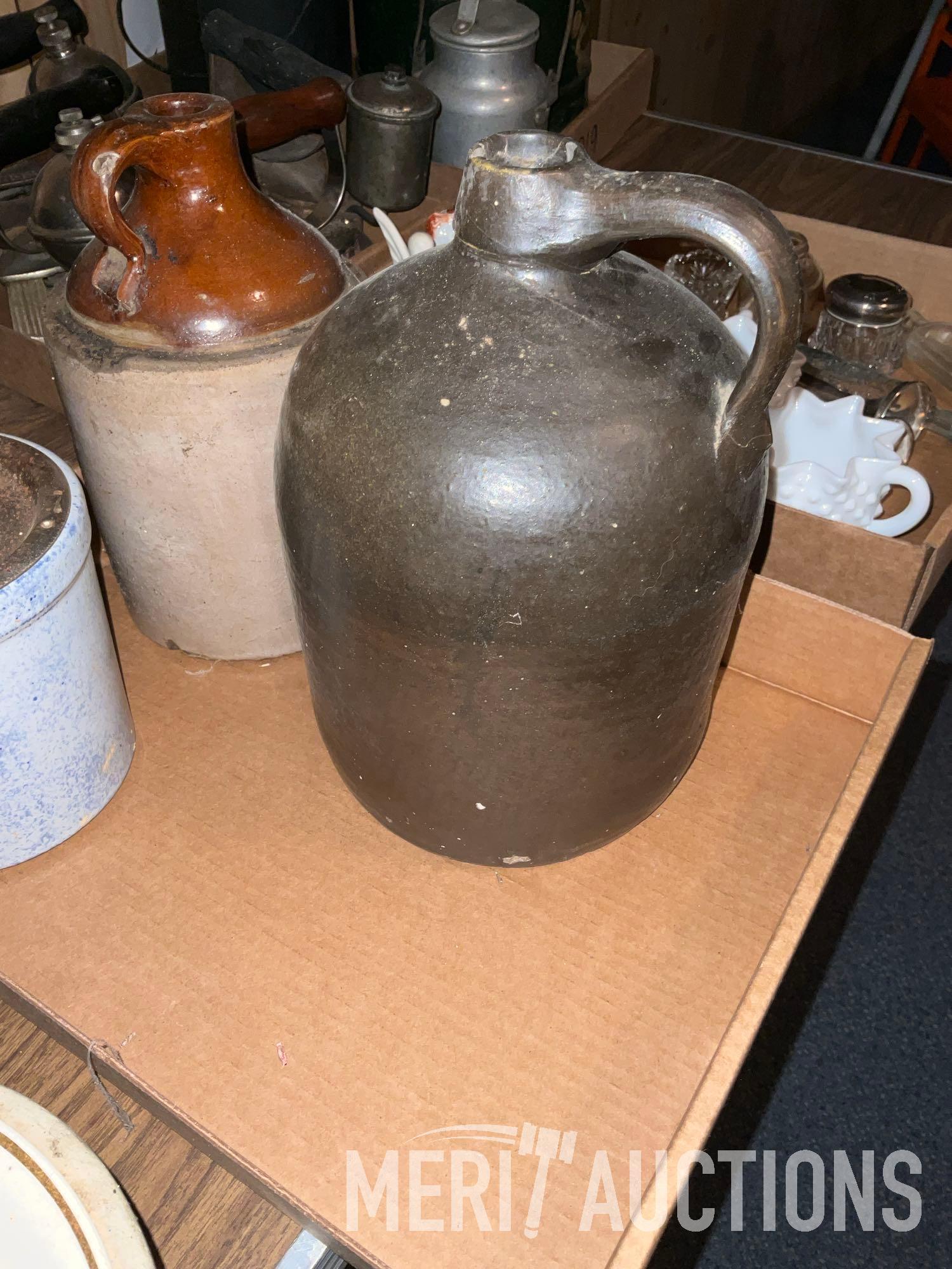 Flat of various stoneware jugs and beater jar