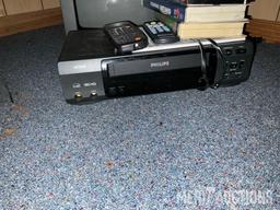 Small Sanyo TV with Phillips VHS player with tapes