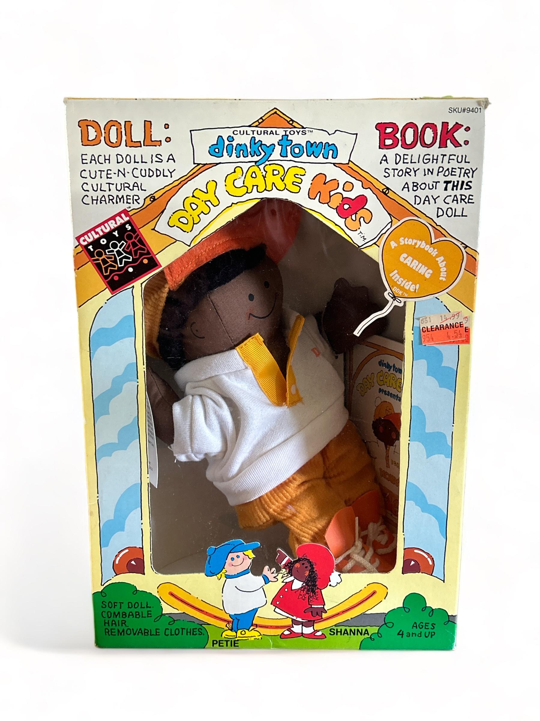 Dinky Town Day Care Kids 10" Koby doll and book
