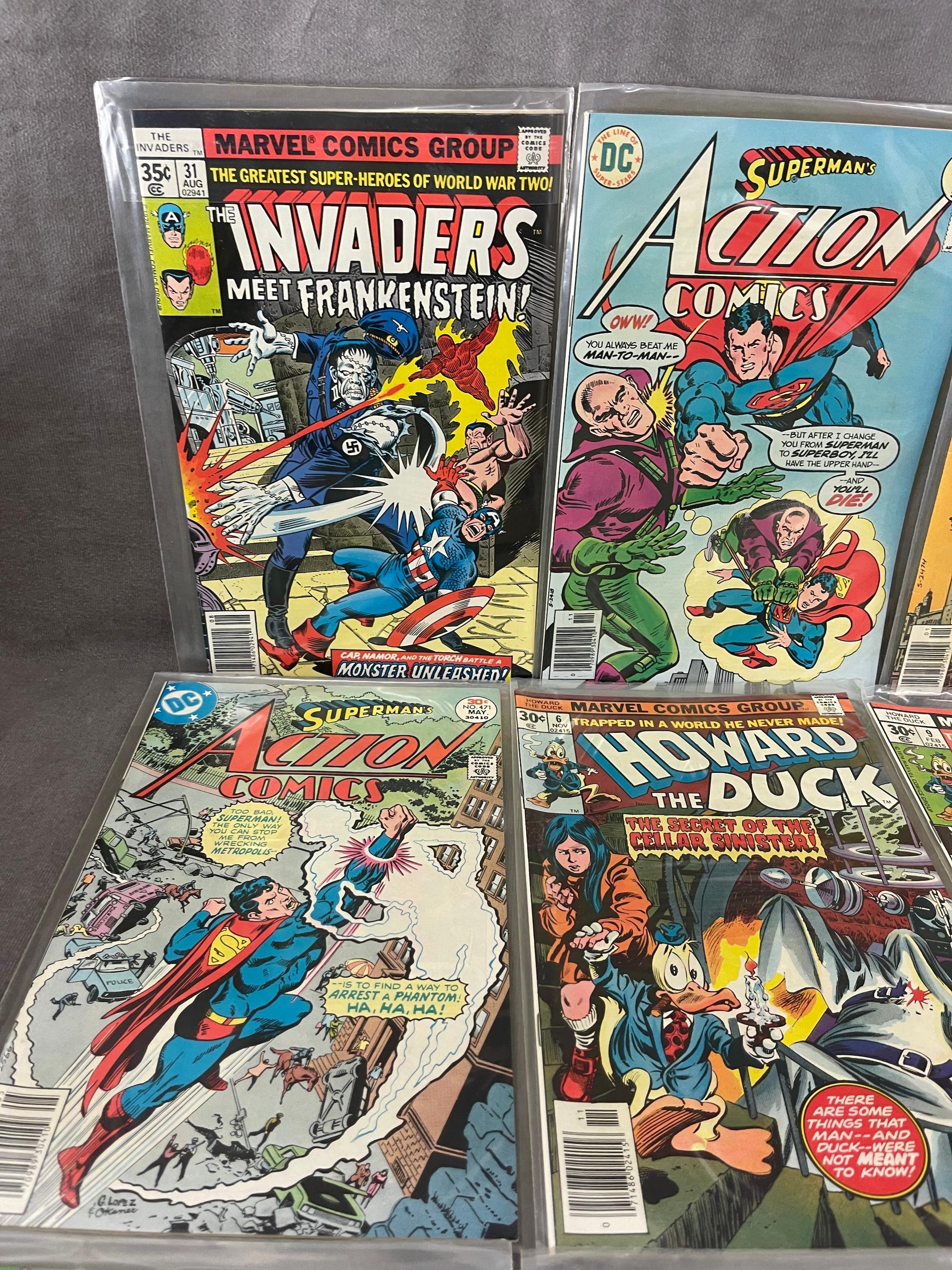 VINTAGE COMIC BOOK COLLECTION INVADERS HOWARD DUCK ACTION COMICS DC AND MARVEL COMICS LOT 20